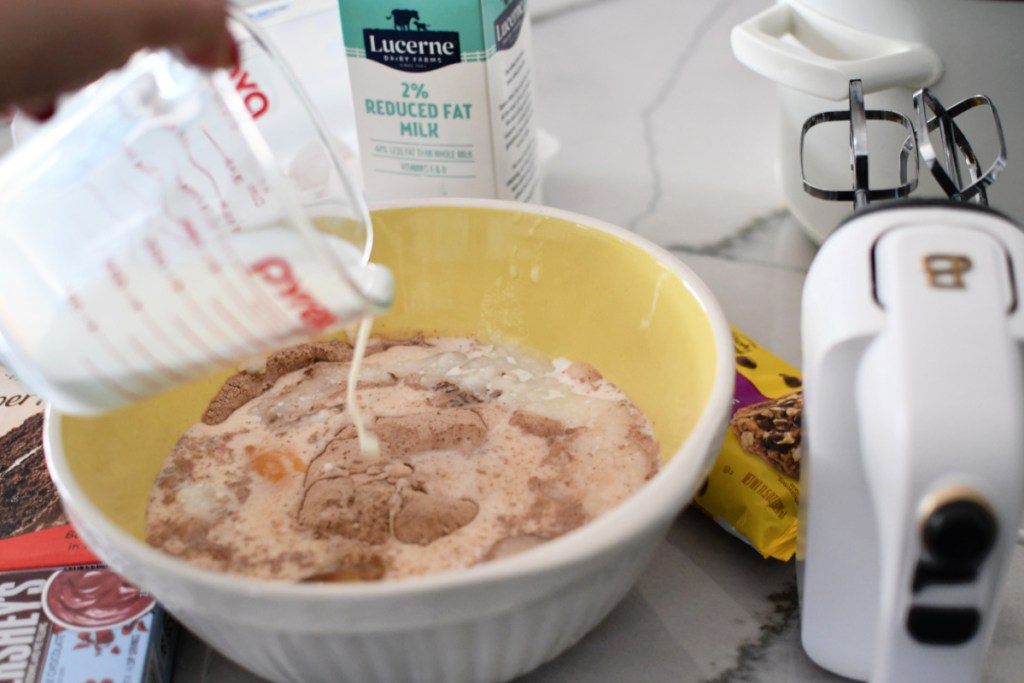 combining cake mix eggs and oil