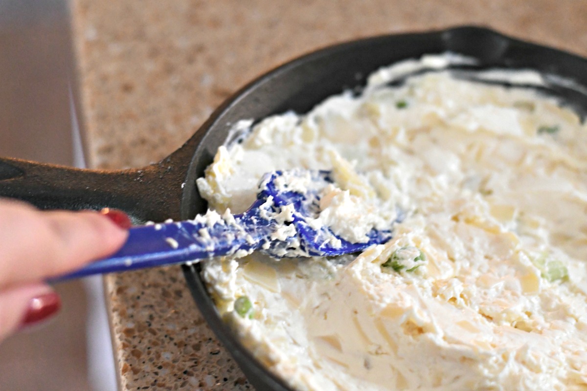 6-ingredient Swiss cheese bacon dip &ndash; smoothing out the dip in a pan