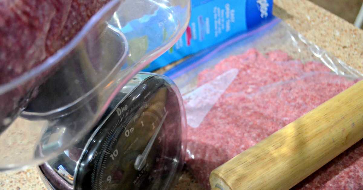 ground beef weighed on a food scale