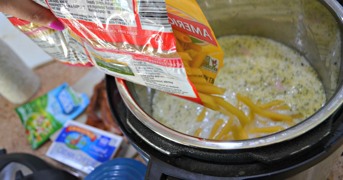 Instant Pot Chicken Ranch Pasta with Bacon &ndash; Pouring noodles into pot