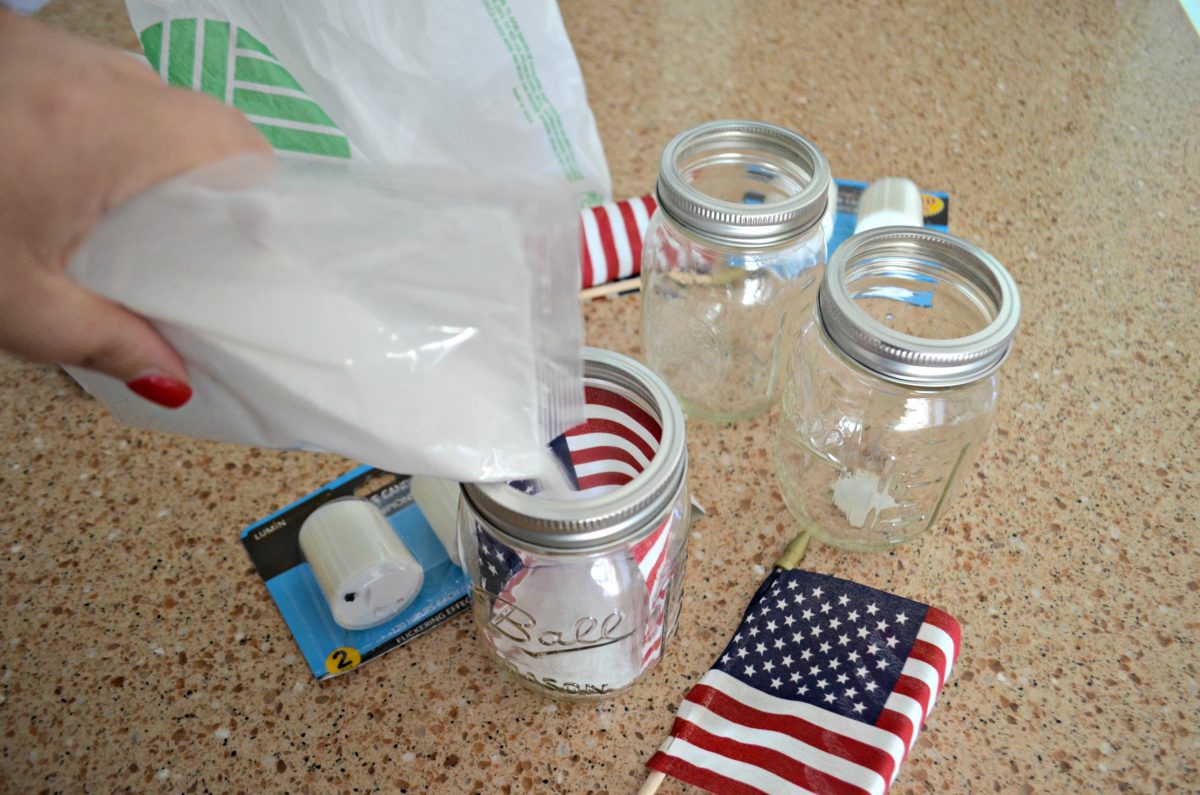 Dollar Tree 4th of July Craft Mason Jar Votives &ndash; filling jars with sand