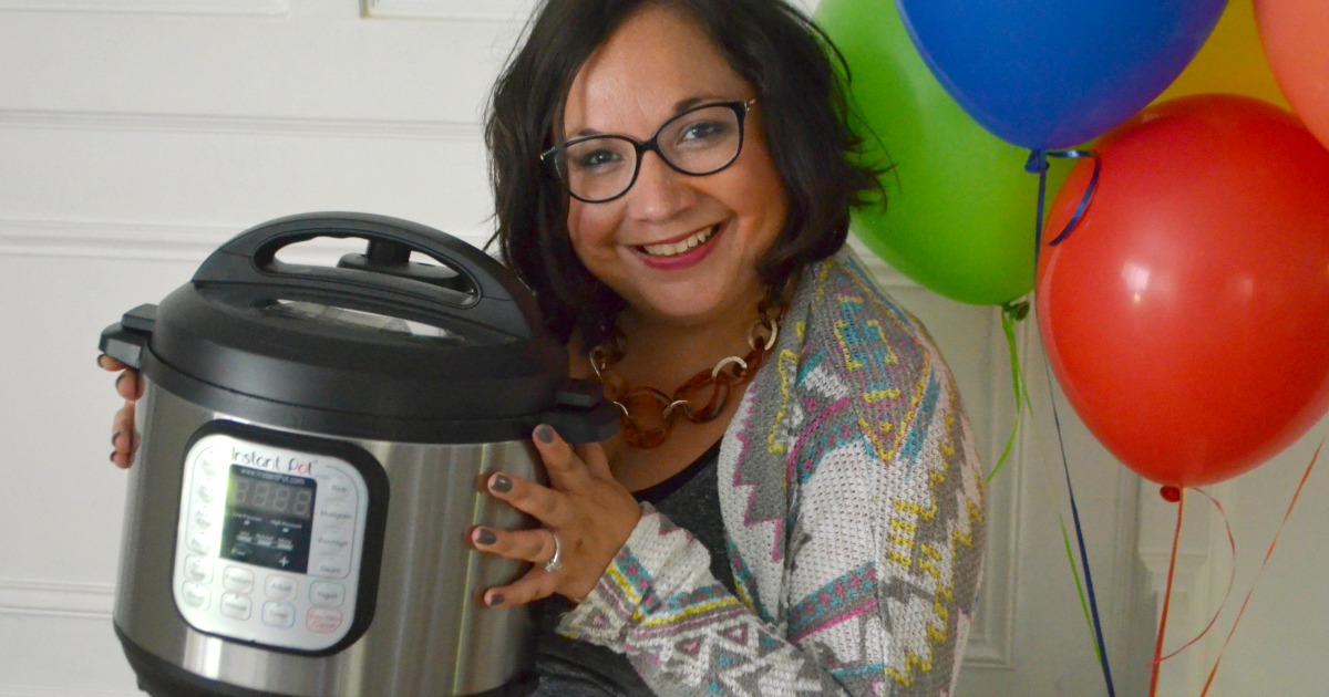 Hip2Save's Top 10 Recipe & DIY Posts of All Time &ndash;&ndash; Lina holding her instant pot
