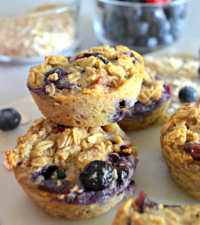 Baked Oatmeal Berry Cups &ndash; the finished muffins stacked on a plate