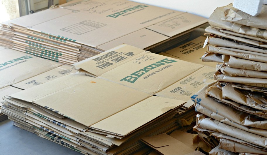 money saving moving tips &mdash; flattened moving boxes you can get for free