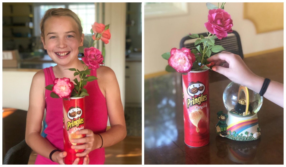 How moving made us feel grateful while having less &ndash; collin's daughter piper holding a pringles vase with flowers