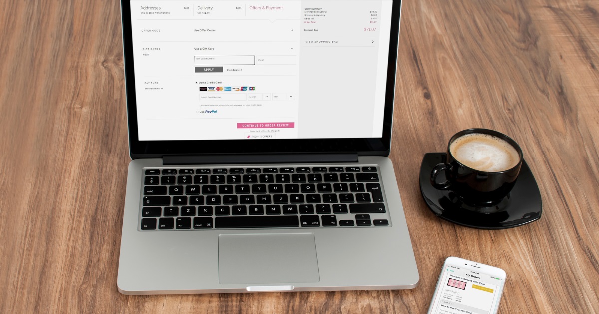 Tips to save money with raise.com gift cards &ndash; Victoria secret site on a laptop and a phone with the gift card information