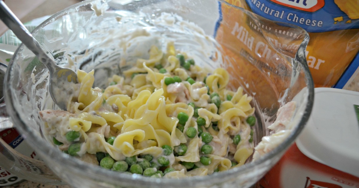 tuna noodle casserole is one of our favorite childhood recipes &ndash; Stirring ingredients in a bowl prior to baking