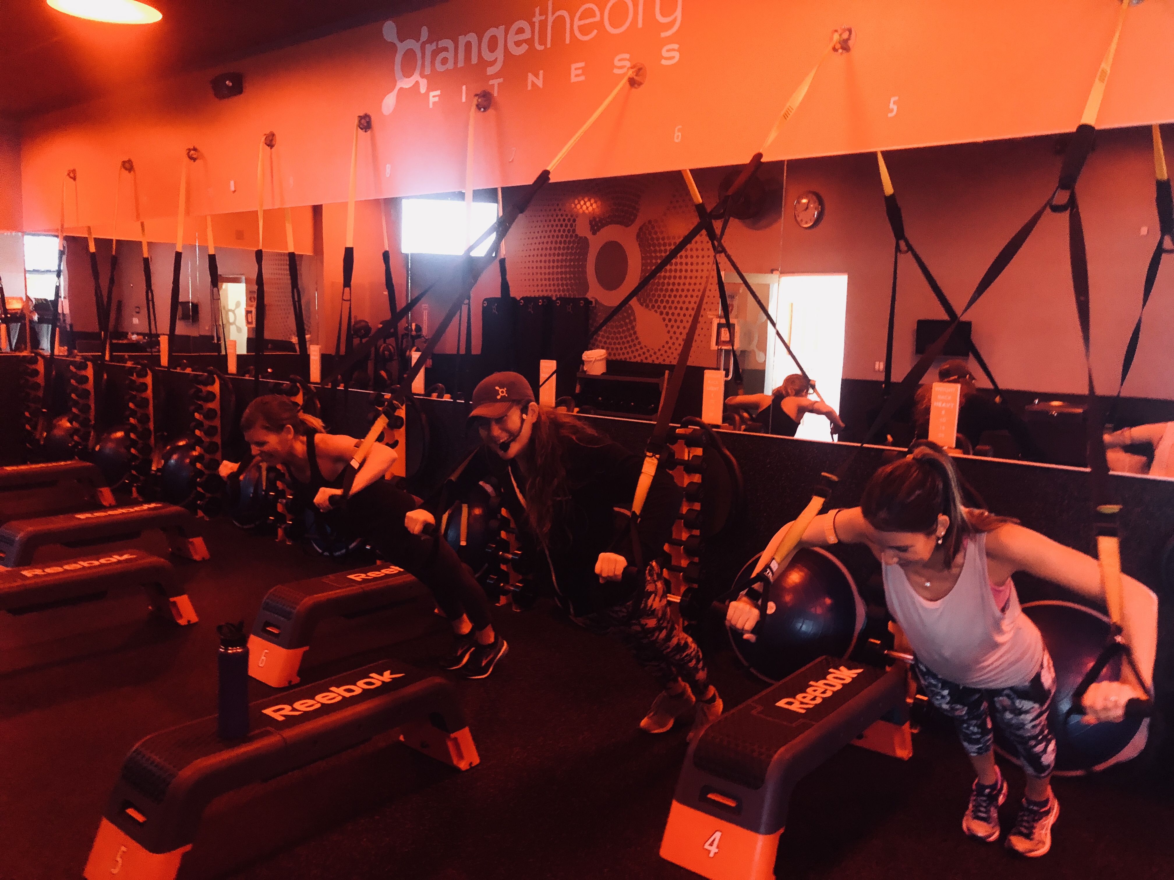 orangetheory fitness review &ndash; Erica working out with her instructor