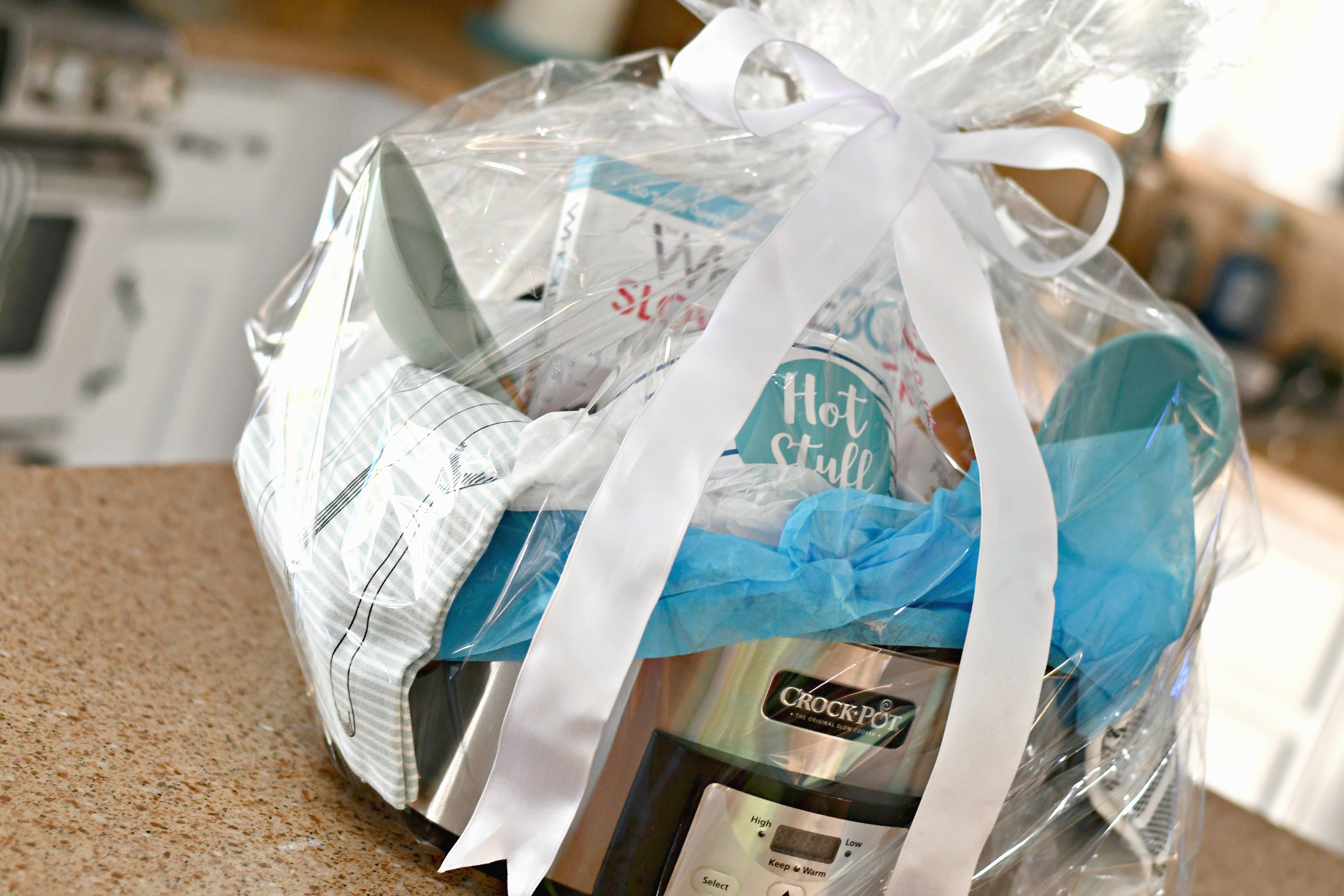 diy gift slow cooker gift basket &ndash; All wrapped with clear plastic and a bow