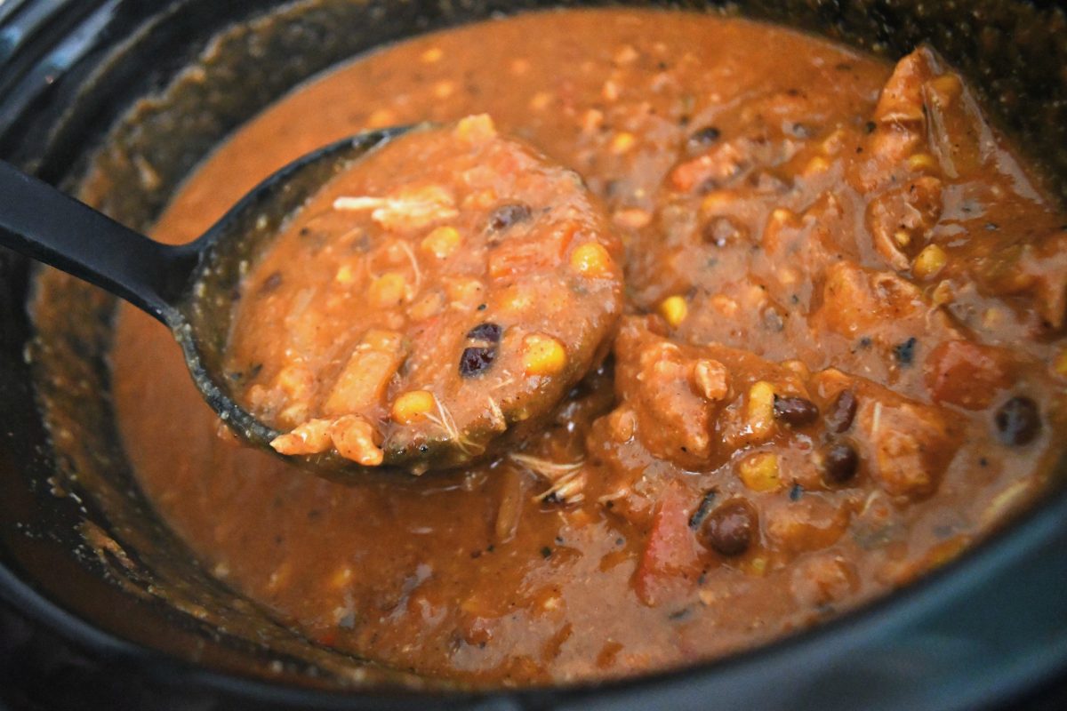 Slow Cooker Chicken Enchilada Soup &ndash; After cooking and scooped up in a ladle
