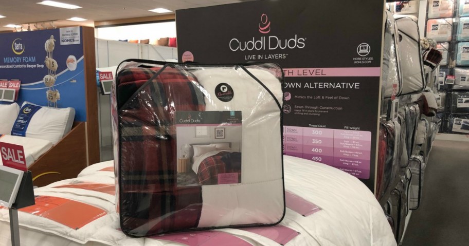 Cuddl Duds Comforter on bed in store