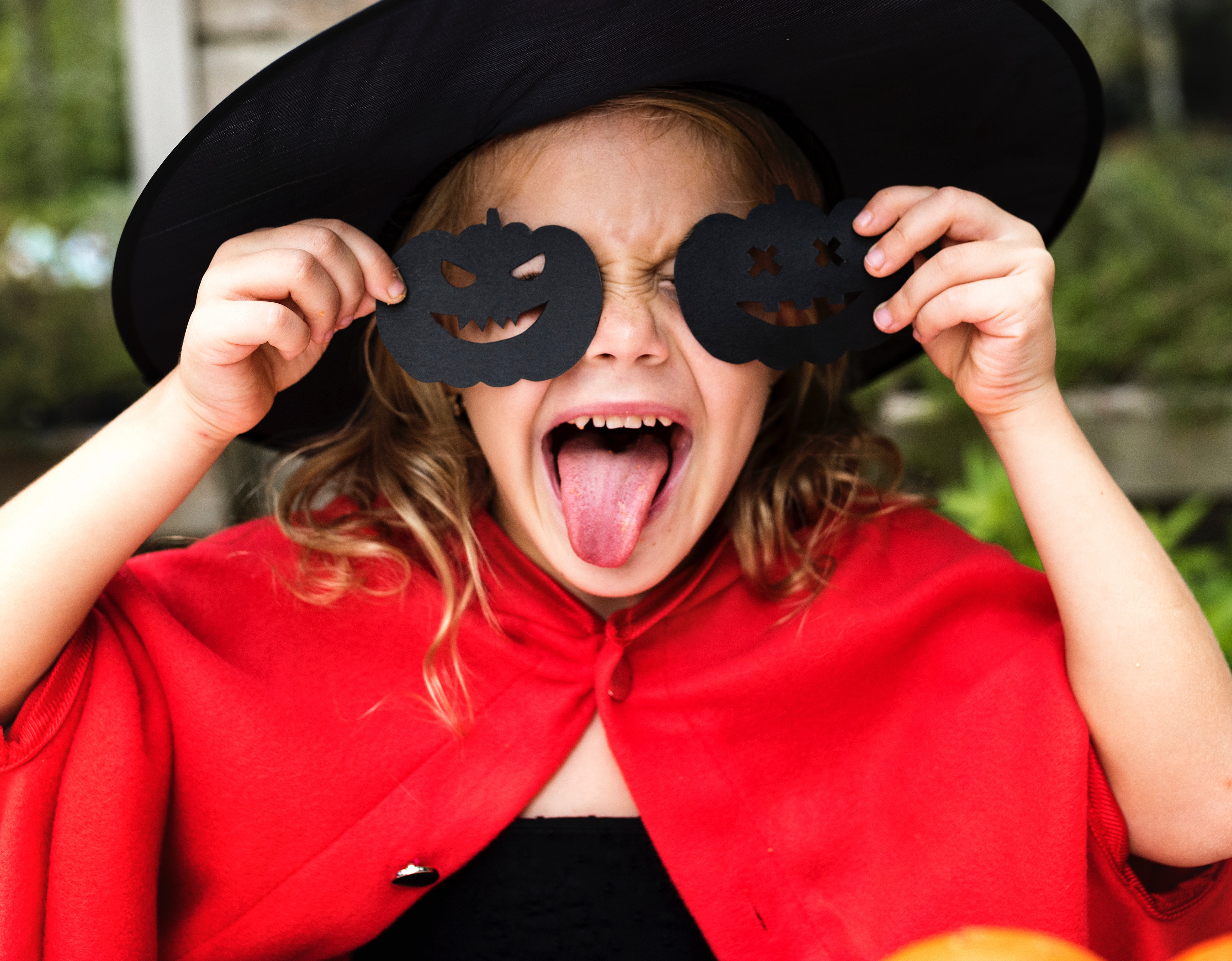 Halloween freebies and deals &ndash; girl dressed as a witch