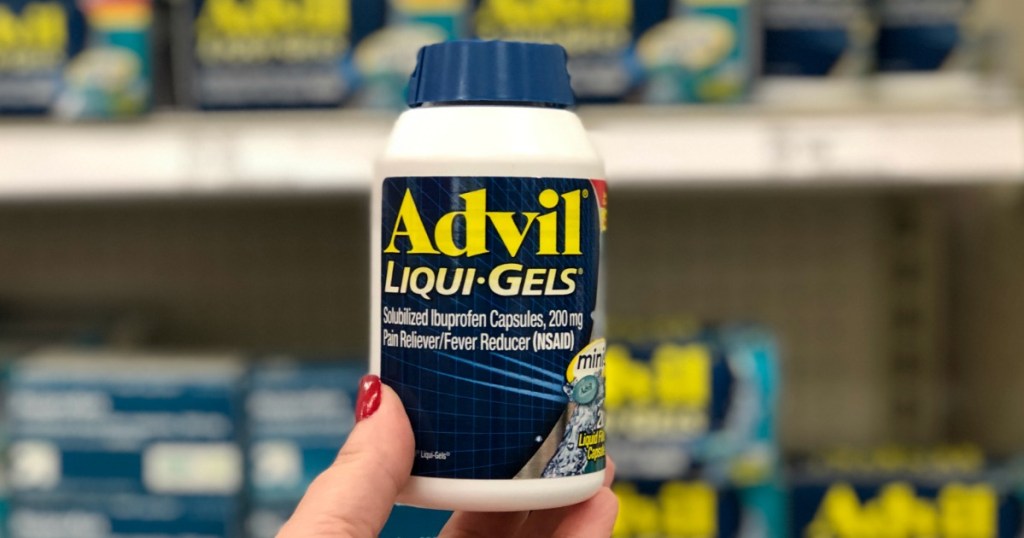 hand holding advil 