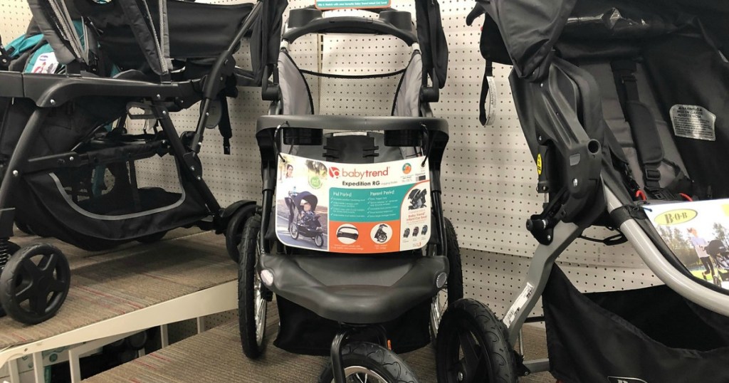 black jogger stroller on shelf
