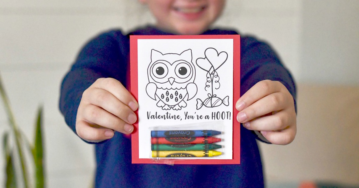 DIY Crayon Valentines (Free Printable Included) &ndash; young child holding an example