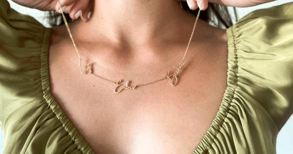 woman wearing custom name necklace