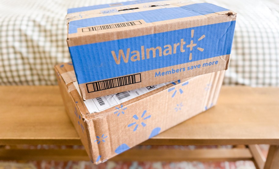 walmart boxes stacked on bench