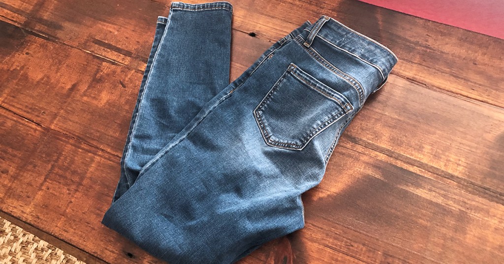released hem denim diy &mdash; jeans at the beginning of the tutorial