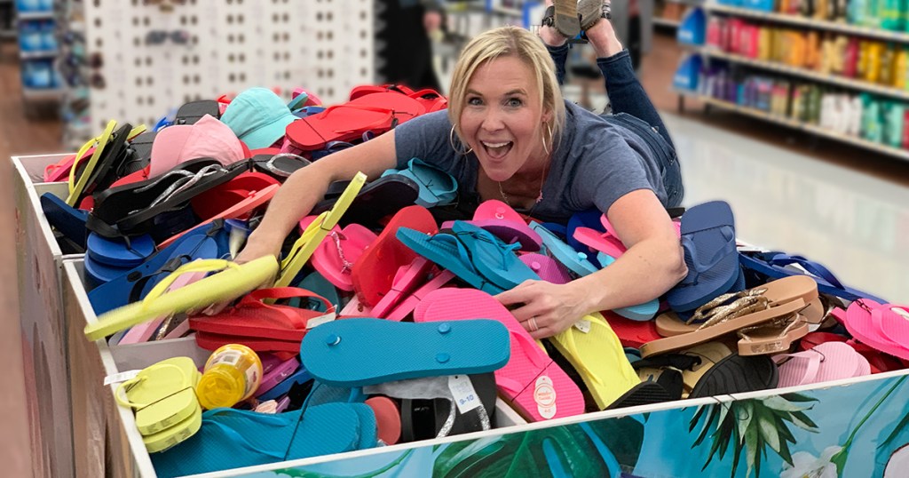 cheap flip flops &mdash; collin on a pile of 98&cent; flip flops at walmart