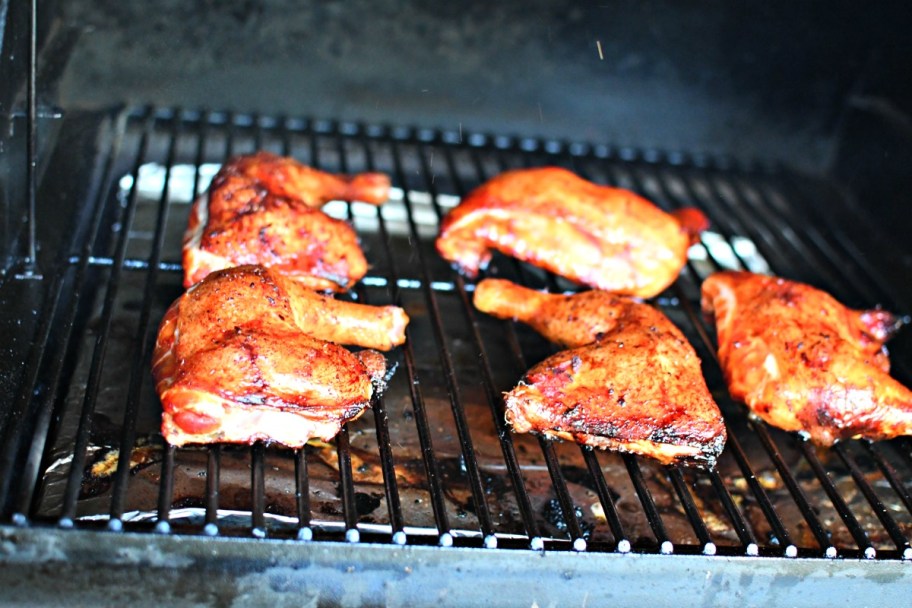 grilled chicken quarters on a traeger grill