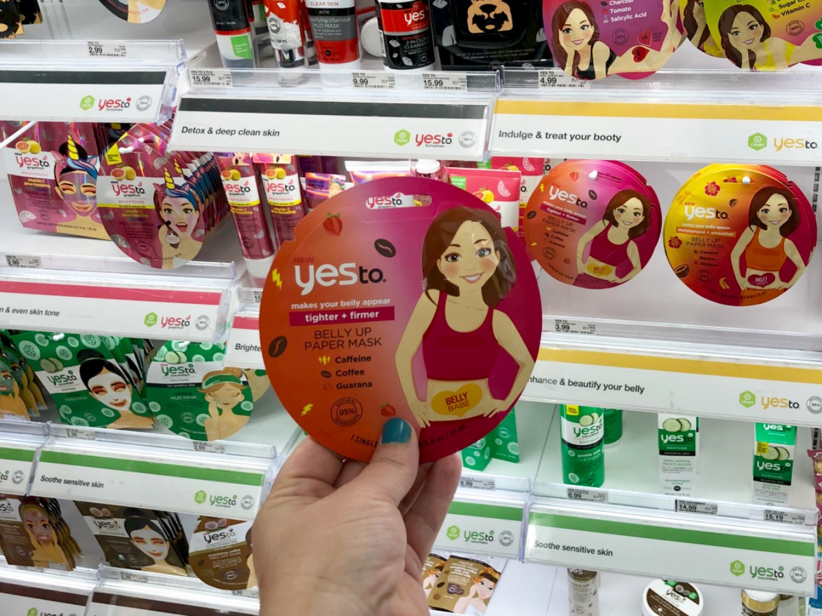 Yes to Belly Masks being held in hand in front of store shelf at Target