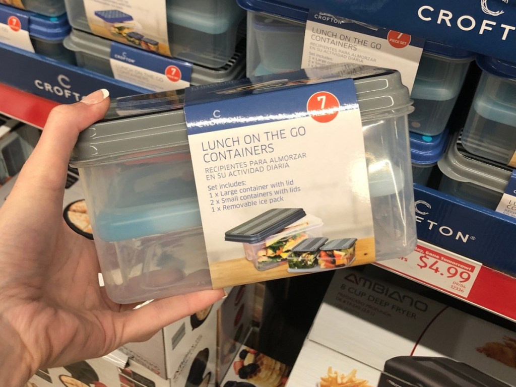 Hand holding Crofton on the go lunch containers at ALDI
