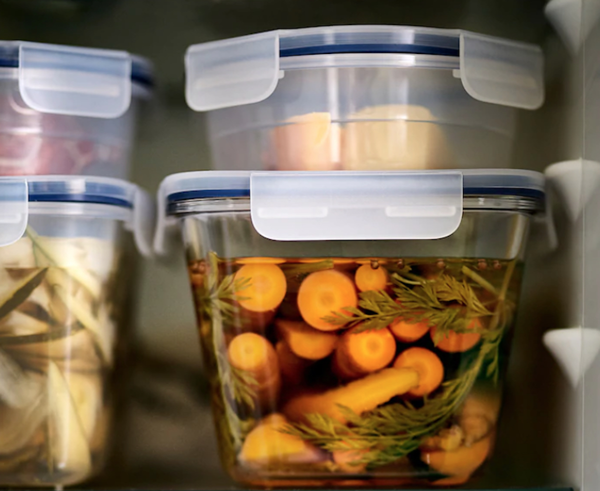 IKEA containers stacked in fridge on top of each other with food