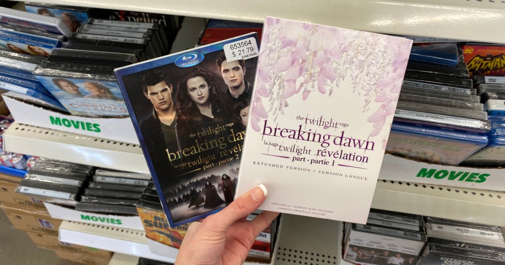 hand holding up two twilight movies