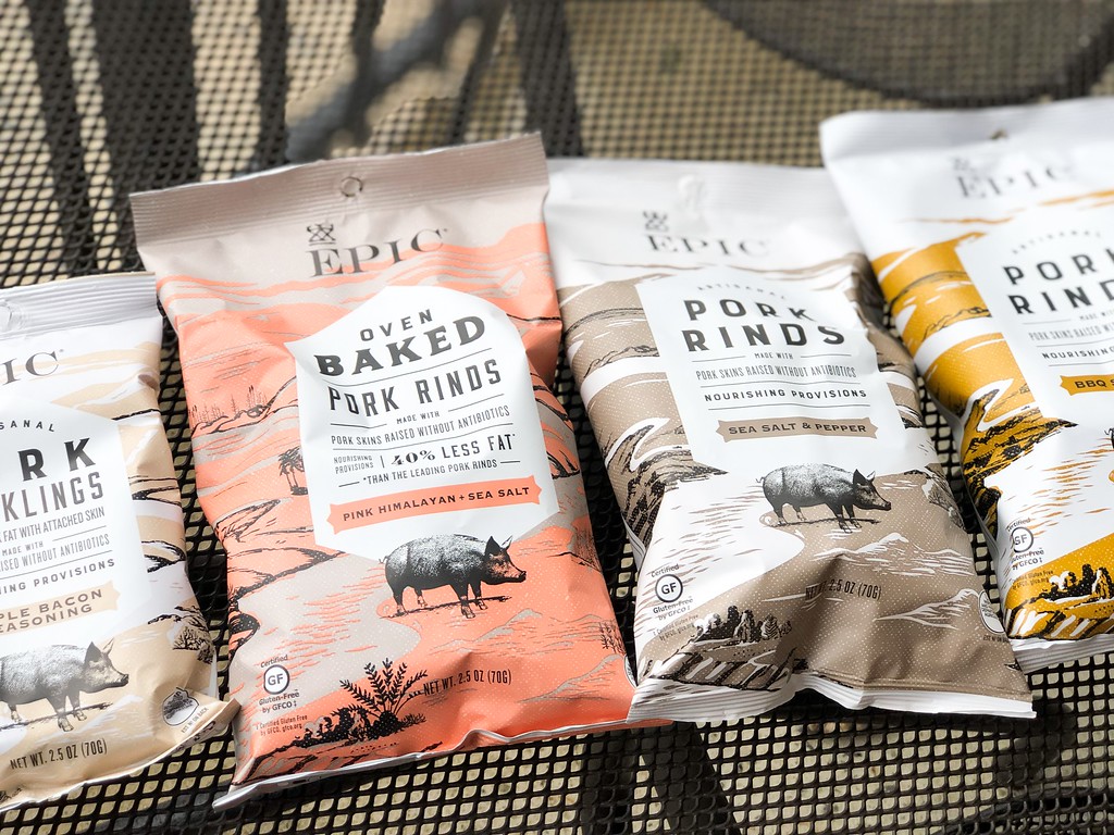 a few bags of EPIC pork rinds laying by each other