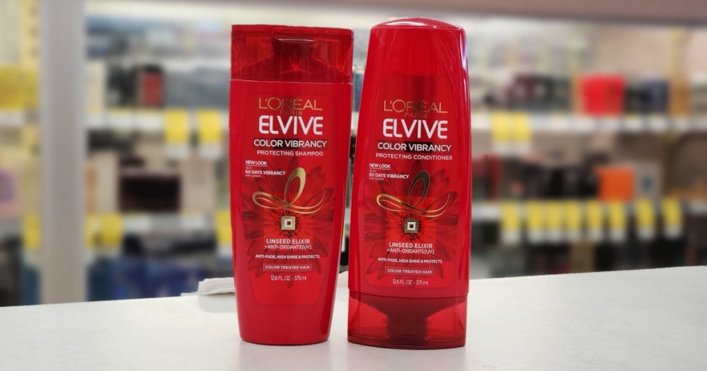 two red bottles of L&rsquo;Or&eacute;al Elvive Shampoos and Conditioners