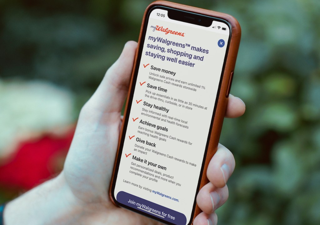 hand holding a phone with myWalgreens app on screen