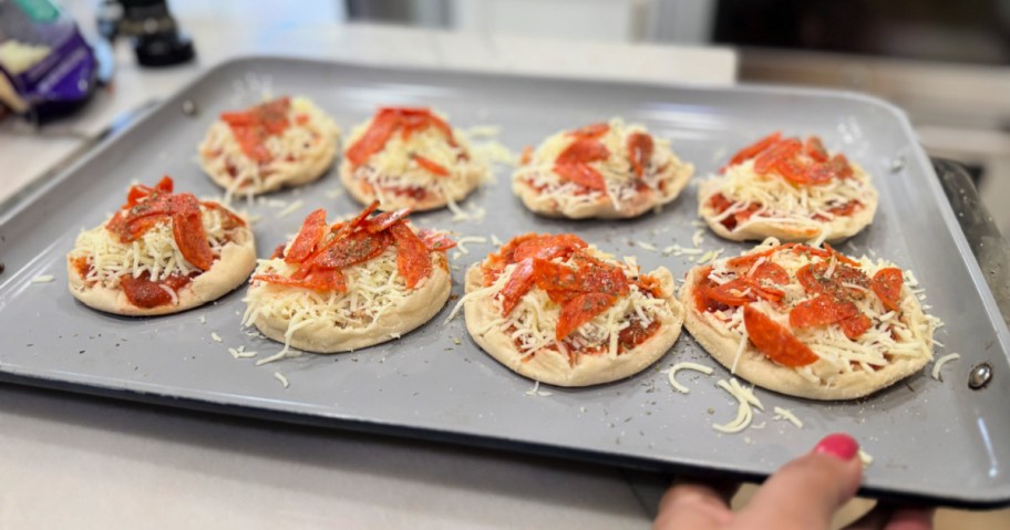 tray of english muffin pizzas ready for the oven 
