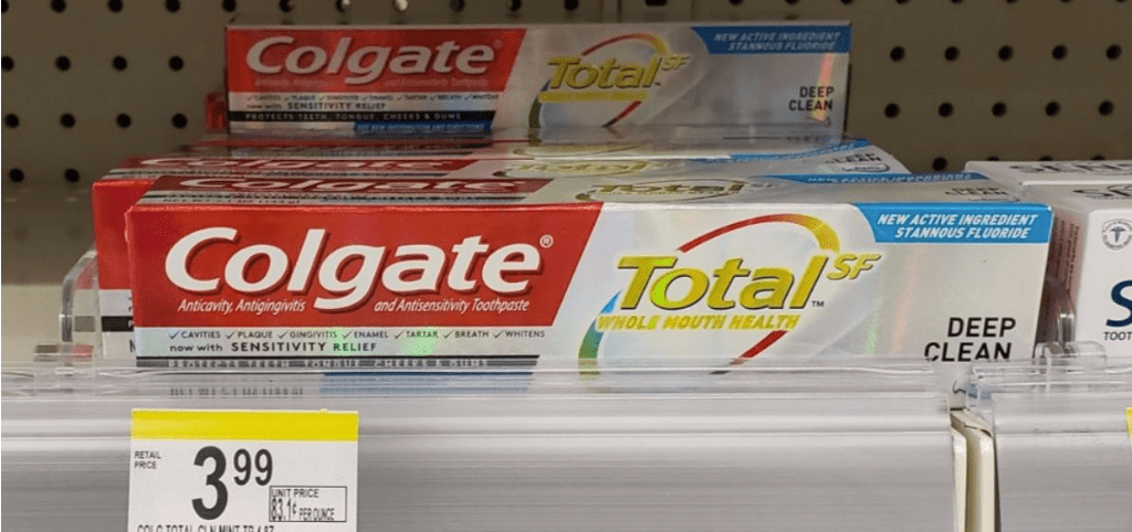 box of toothpaste sitting on a store shelf