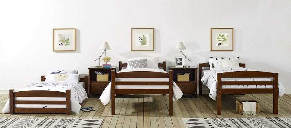 bedroom with three beds