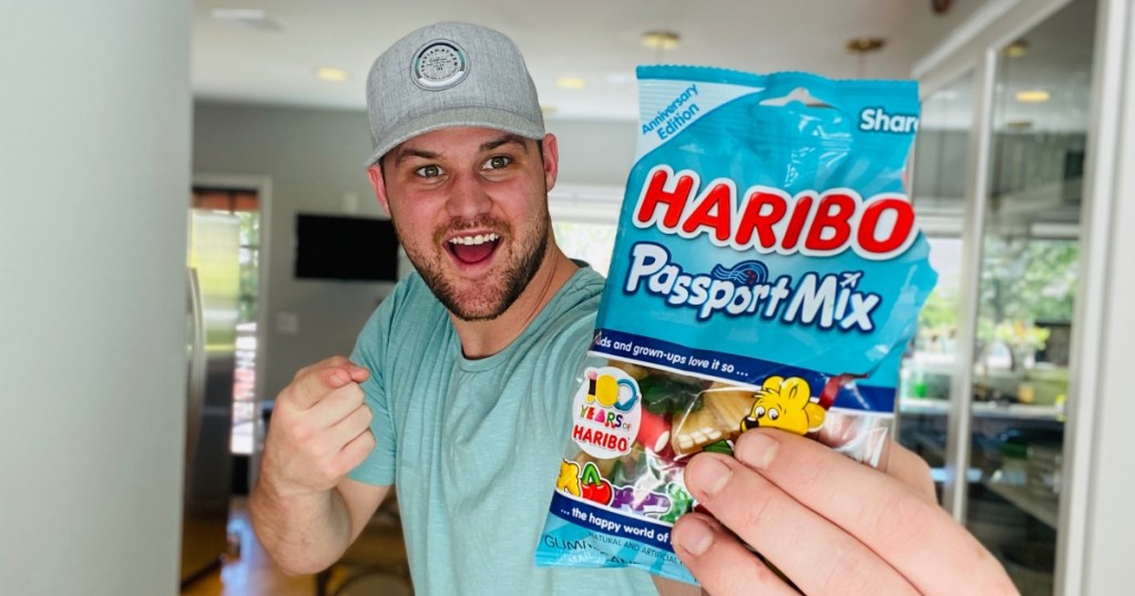 man holding bag of Haribo candy