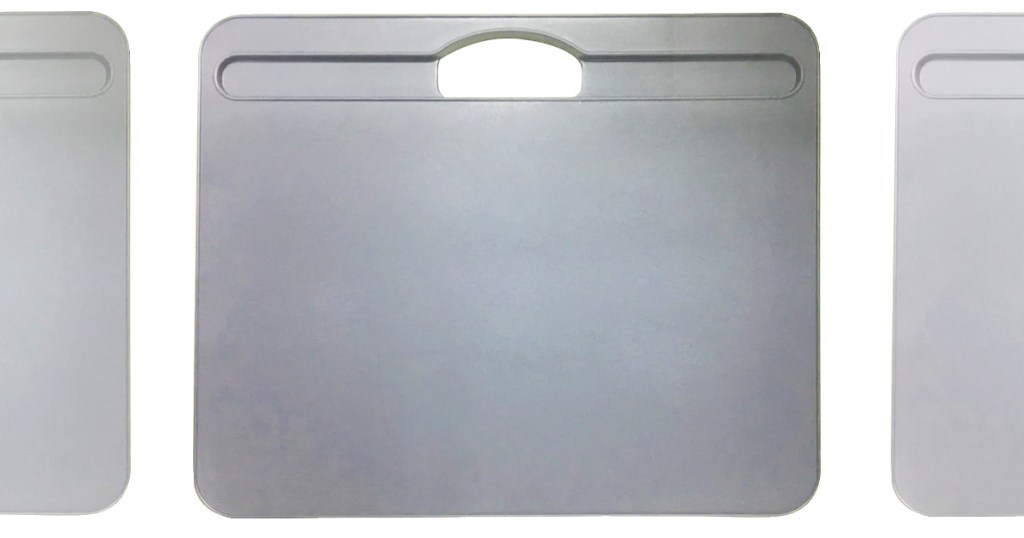 rectangular grey lap desk with carrying handle and indentation to hold pencils at the top