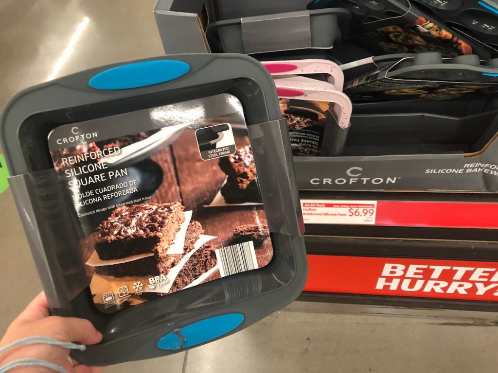 hand holding a Crofton Silicone Square Pan