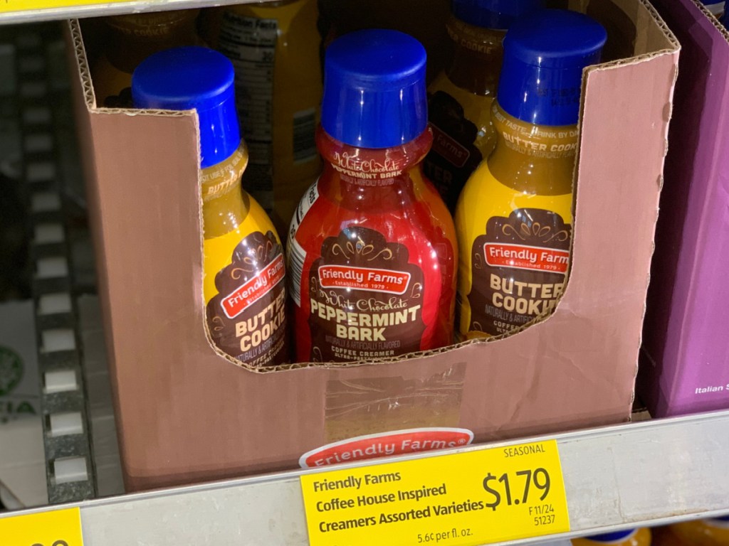 box of peppermint bark and butter cookie creamers on store shelf