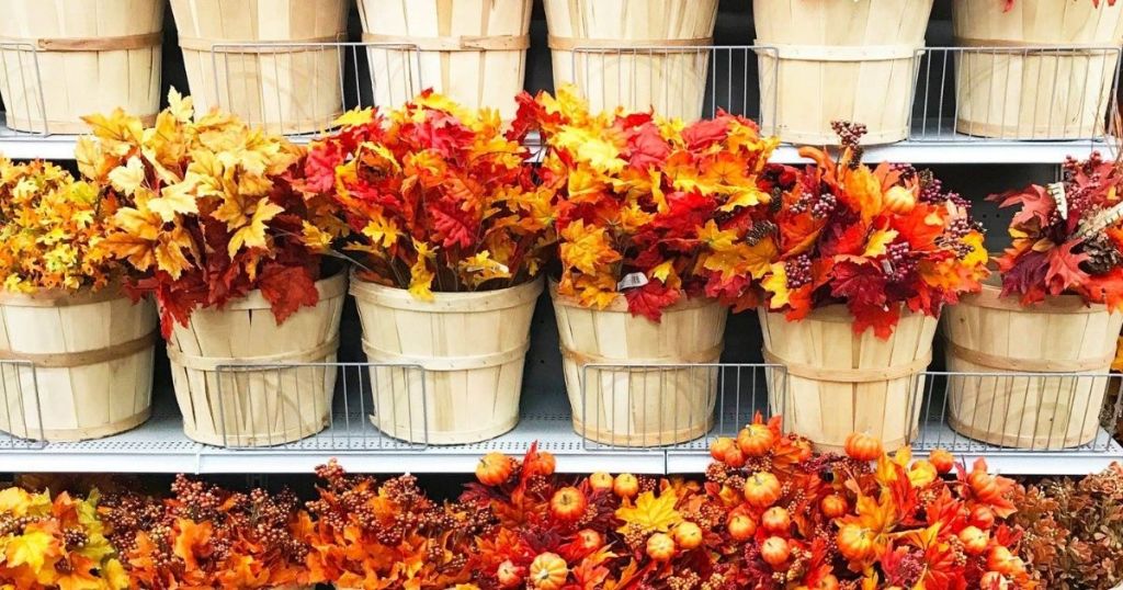 row of baskets with faux leaves in them at Michaels
