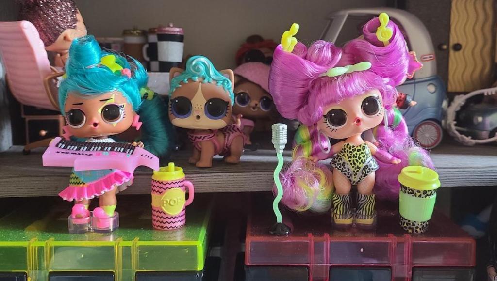 two L.O.L. Surprise! Remix Hair Flip Dolls on shelf next to each other