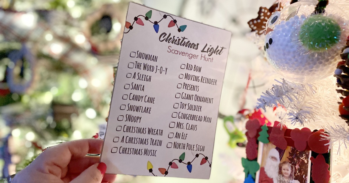 holding a christmas light scavenger h