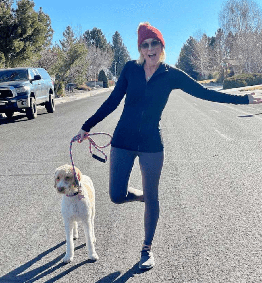 woman walking dog