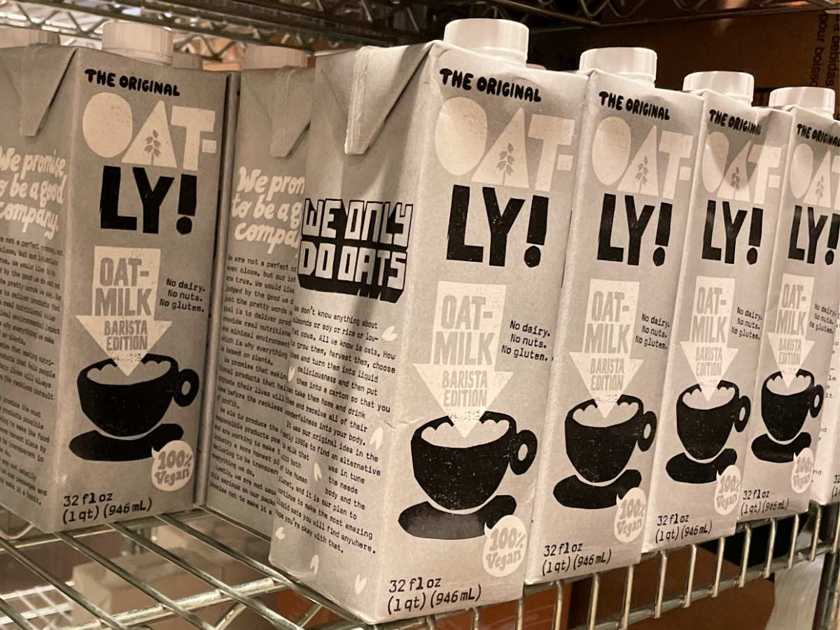 shelf with oatly oatmilk barista edition