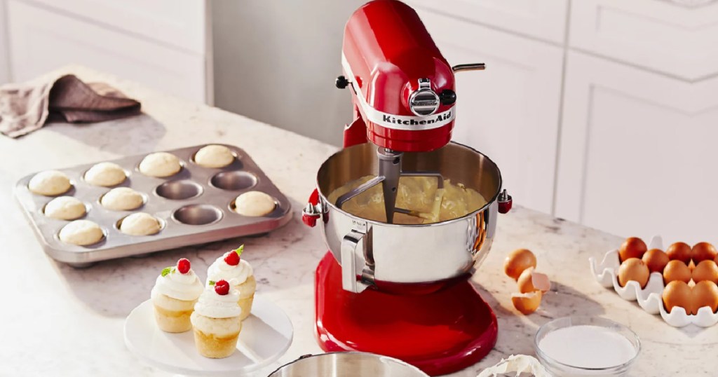 red kitchenaid stand mixer on a kitchen counter 
