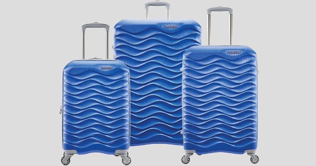 3 blue luggage on wheels