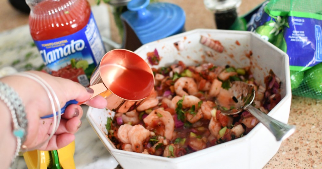 adding clamato to shrimp cocktail