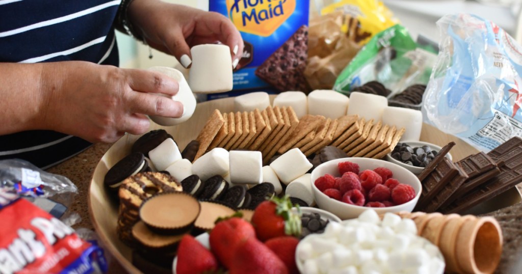 making a charcuterie board with s'more fixings