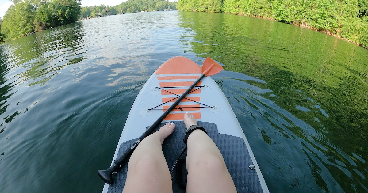 Woman's legs on paddle board