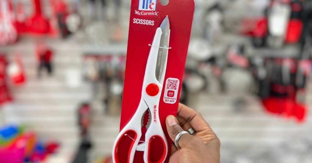 hand holding McCormick Scissors