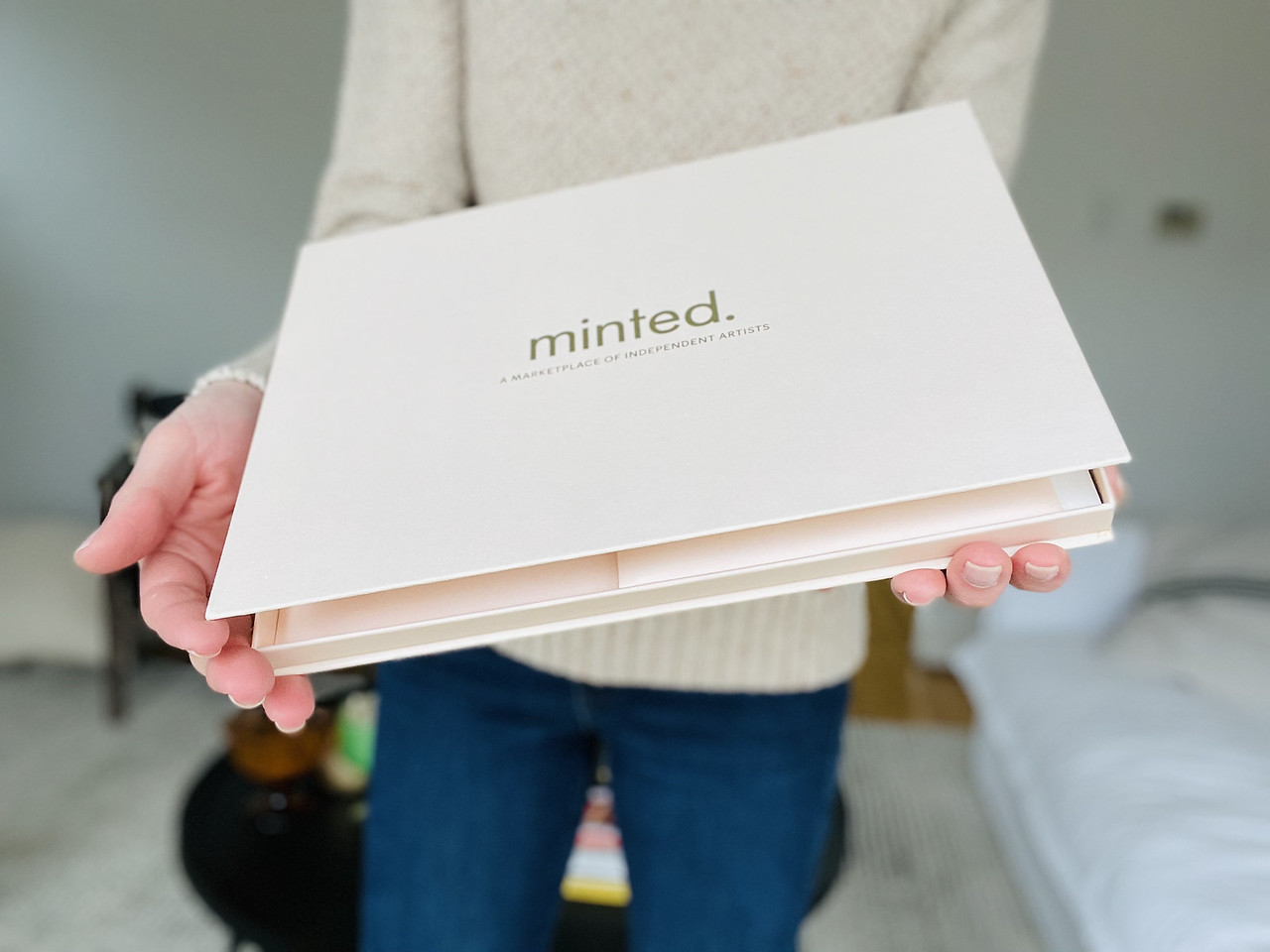 woman holding a Minted Box